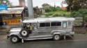 A silver Jeepney